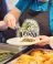 A person with an apron branded with FoodCycle's logo putting some food on a plate.