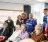 A656960_Peterborough-United-Foundation_Extra-Time-Hub_Harry-Cureton-Fund-aspect-ratio-8-7 A group of people huddled together. Some people are standing, hugging or sitting down.