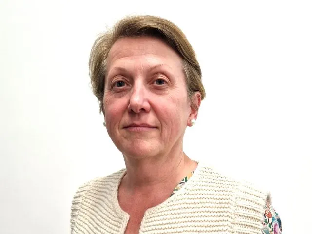 Headshot of Alison Griffiths on a white background.