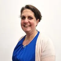 Headshot of Ruth Lockley on white background.