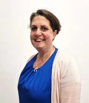 Headshot of Ruth Lockley on white background.