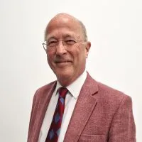 Headshot of Simon Sperryn on a white background.