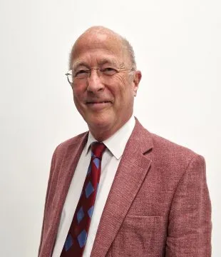 Headshot of Simon Sperryn on a white background.