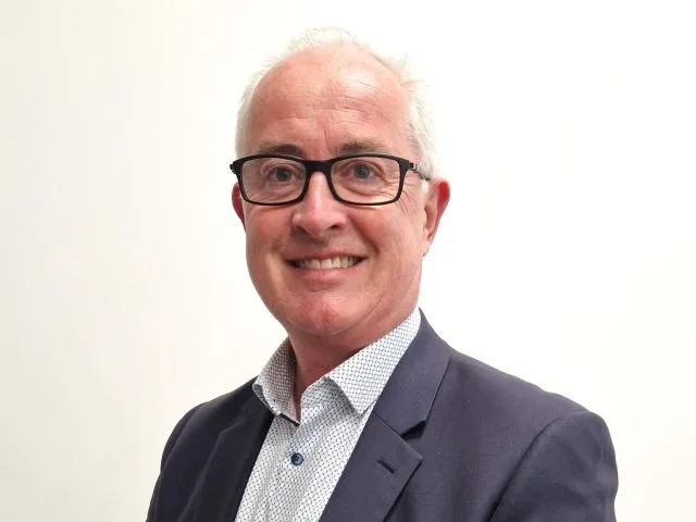 Headshot of Stephen Catling on a white background.