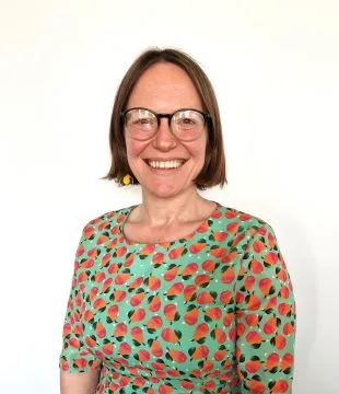 Headshot of Chloe Woolgar on a white background.