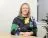 Janine Collier from Tees sits smiling in an office